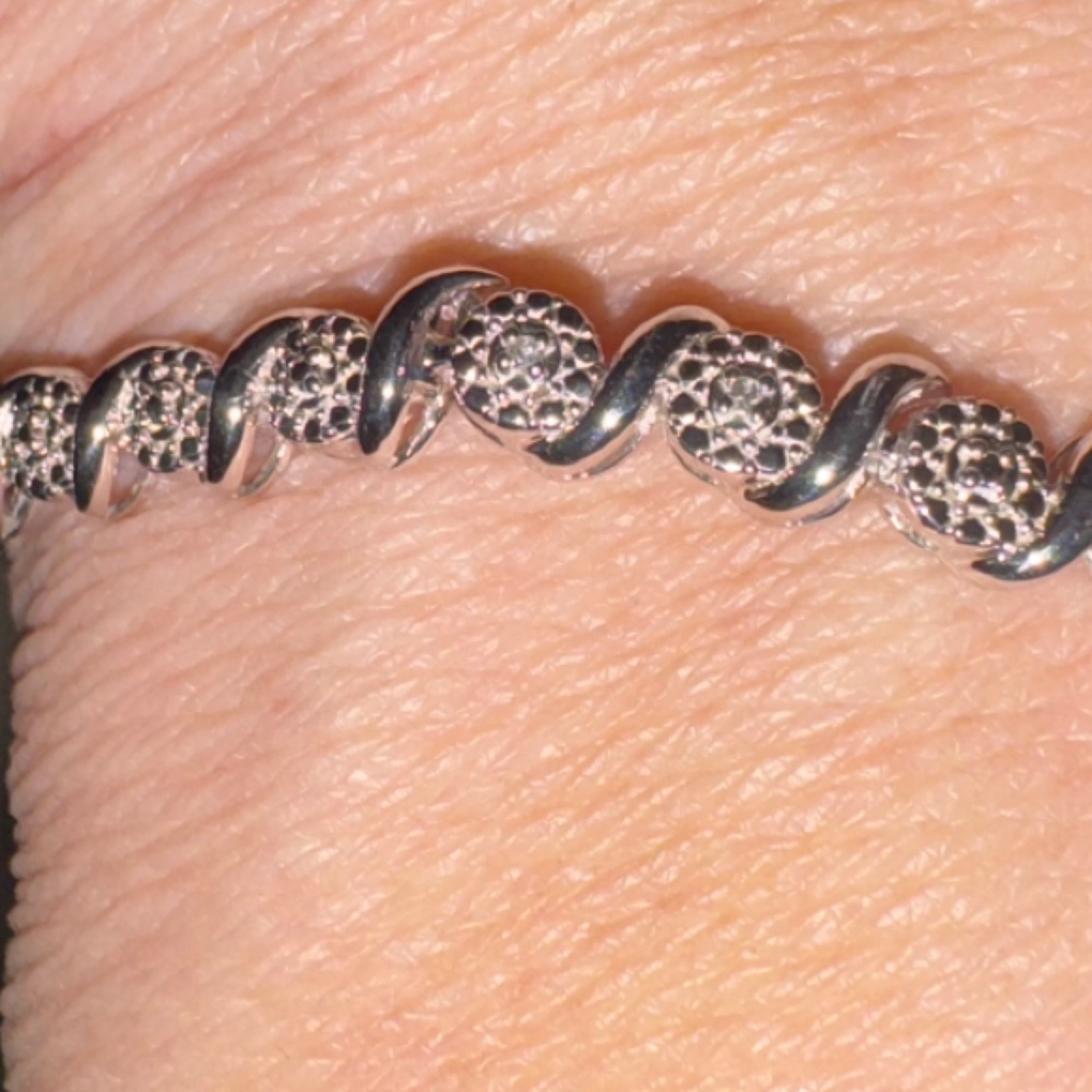 Silver Beaded Bracelet with Intricate Design